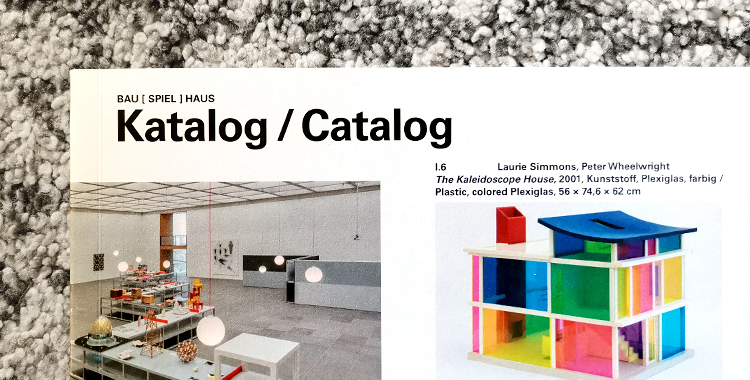 Top left section of the cover of the exhibition catalog Bau Spiel Haus.